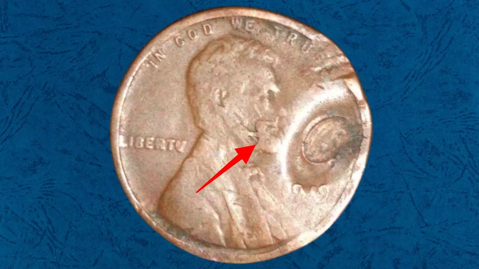 1919-S wheat penny die cud error showing smooth raised blank metal mass along coin rim where die fragment broke away